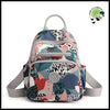 Sac à Dos de Voyage en Nylon Luxueux Imprimé Floral pour Femmes - 01 - dos avec motifs floraux et naturels