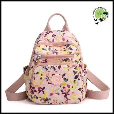 Sac à Dos de Voyage en Nylon Luxueux Imprimé Floral pour Femmes - 02 - dos avec motifs floraux et naturels