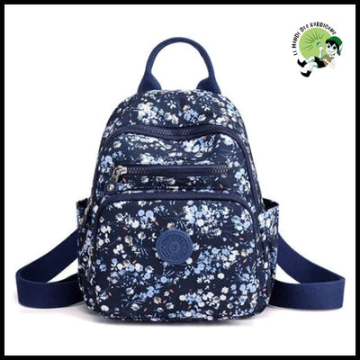 Sac à Dos de Voyage en Nylon Luxueux Imprimé Floral pour Femmes - 05 - dos avec motifs floraux et naturels