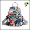 Sac à Dos de Voyage en Nylon Luxueux Imprimé Floral pour Femmes - dos avec motifs floraux et naturels