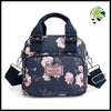 Sac Bandoulière Femme en Nylon Imprimé Fleurs - 1 - Valises vintage avec des illustrations botaniques